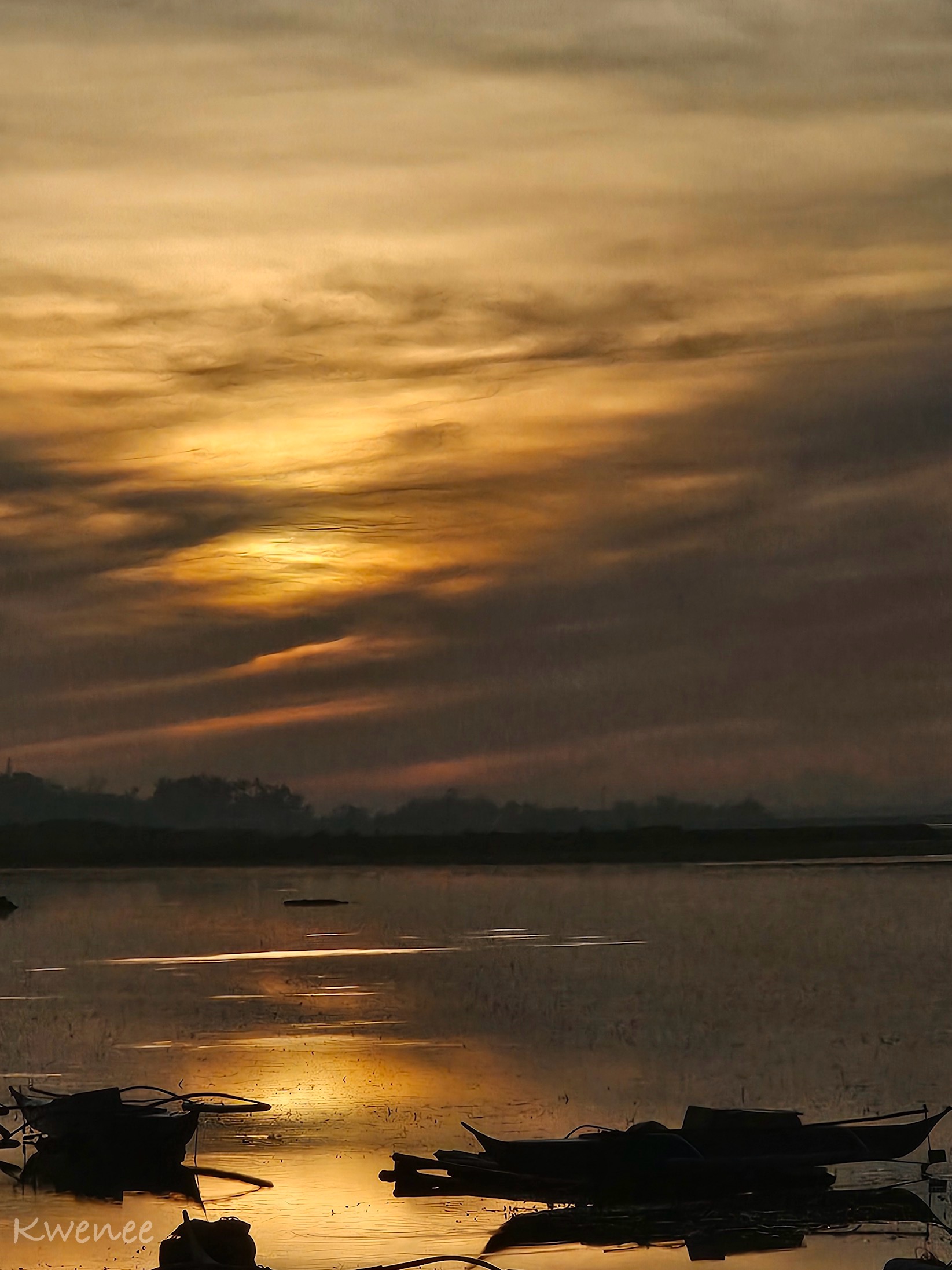 Golden sunrise over Cebu waters with fishing boats
